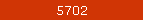 5702